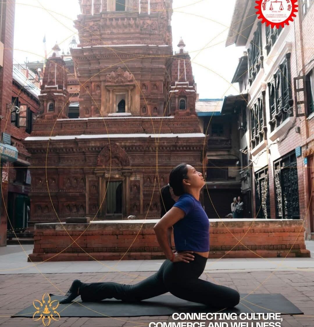 Practitioner seated before a Newari shrine inside a Patan courtyard