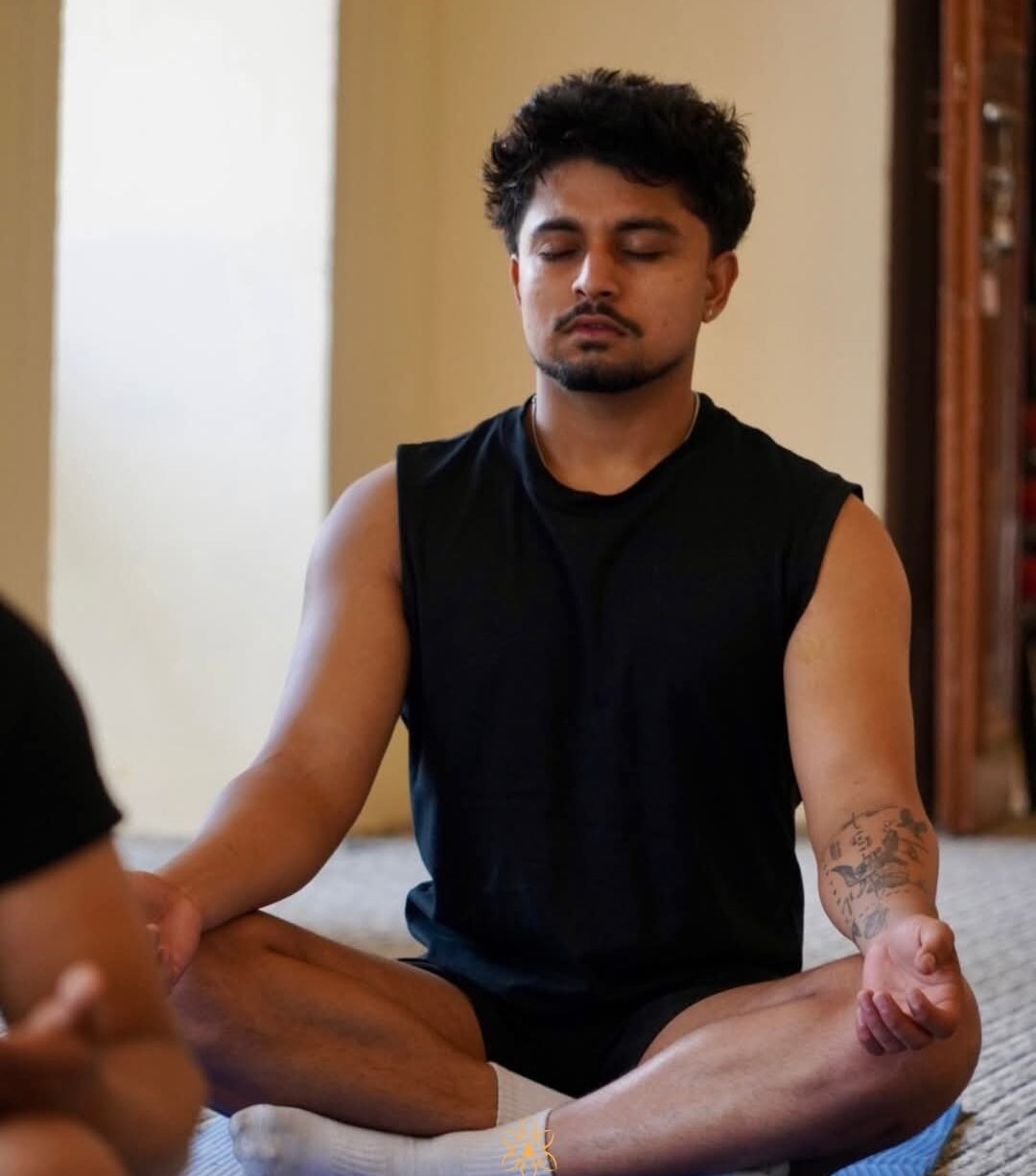 A calm moment of seated meditation in the Yogamazing studio